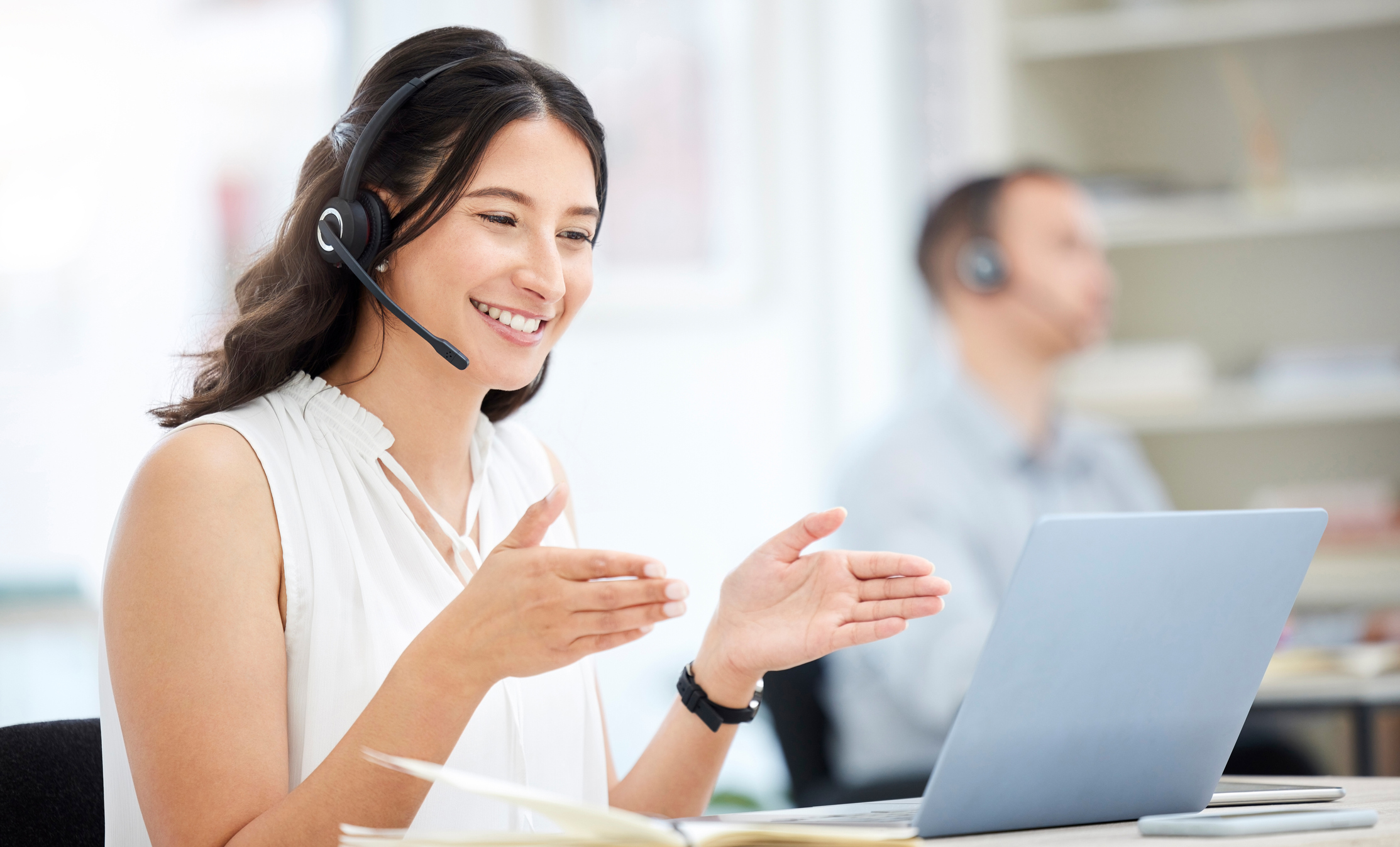 A woman on a phone service headphone for get to know your customers day